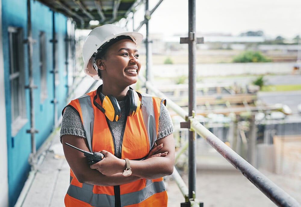 SideImage_WomanSmileWalkieTalkie_524591762
